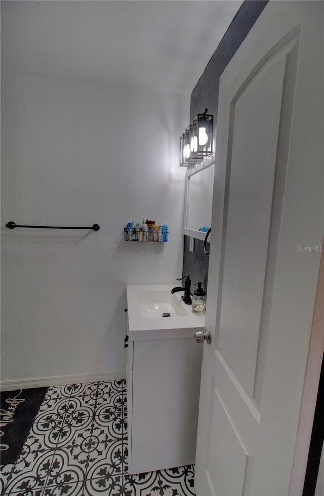 bathroom featuring vanity and tile patterned flooring