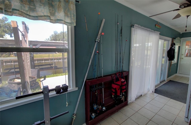 interior space featuring ceiling fan