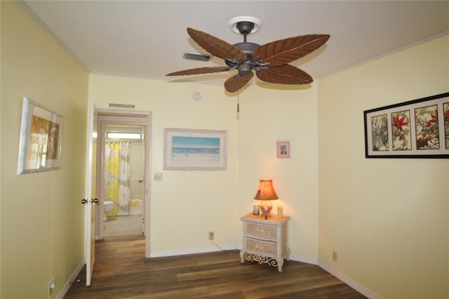 bedroom with dark wood-type flooring and ceiling fan