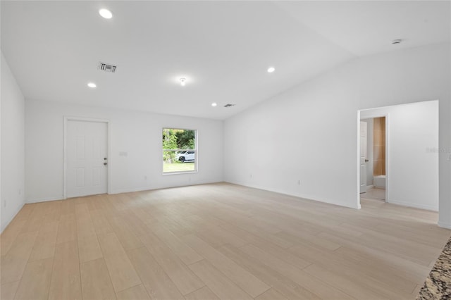 3848 NW 19th Ave, Okeechobee, FL 34972 - spare room with light wood-type flooring, visible vents, recessed lighting, baseboards, and lofted ceiling