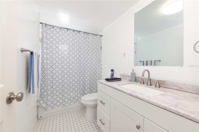 full bathroom with vanity, toilet, and shower / tub combo with curtain