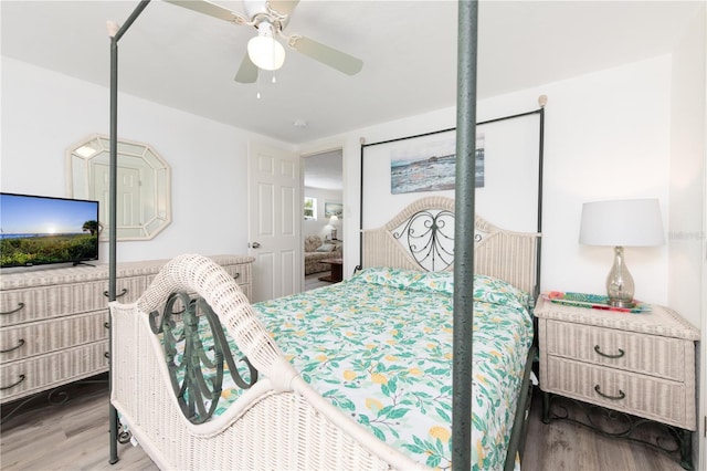 bedroom featuring wood-type flooring and ceiling fan