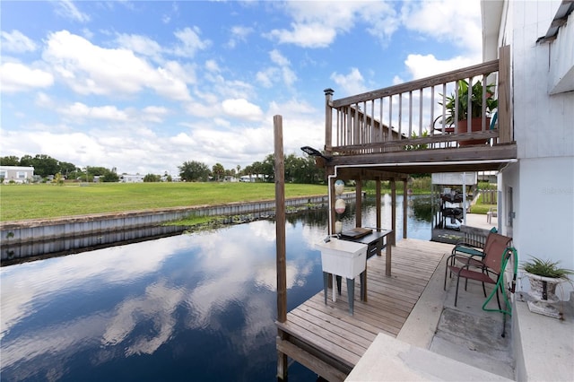 dock area with a water view