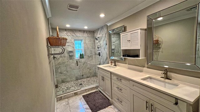 245 Lake Seminary Cir, Maitland, FL 32751 - full bathroom with a sink, visible vents, double vanity, and a shower stall