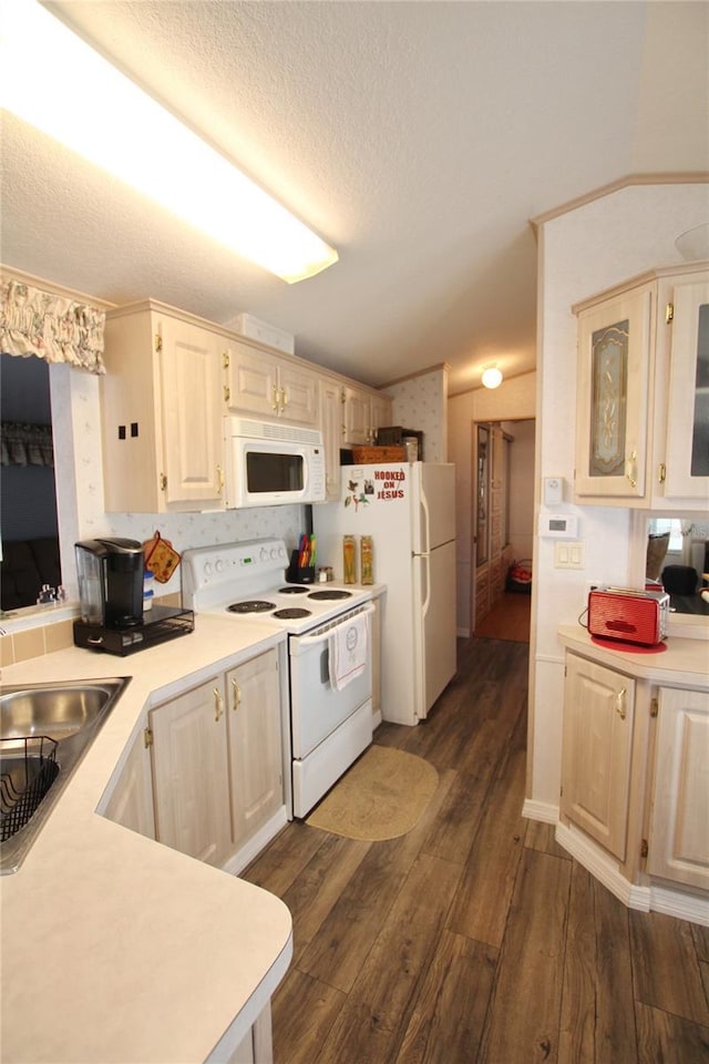 kitchen with white appliances, glass insert cabinets, dark wood-type flooring, light countertops, and a textured ceiling