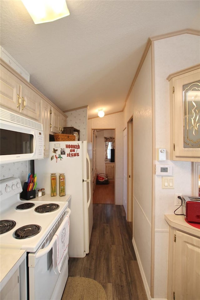 kitchen with white appliances, crown molding, light countertops, and dark wood-style flooring