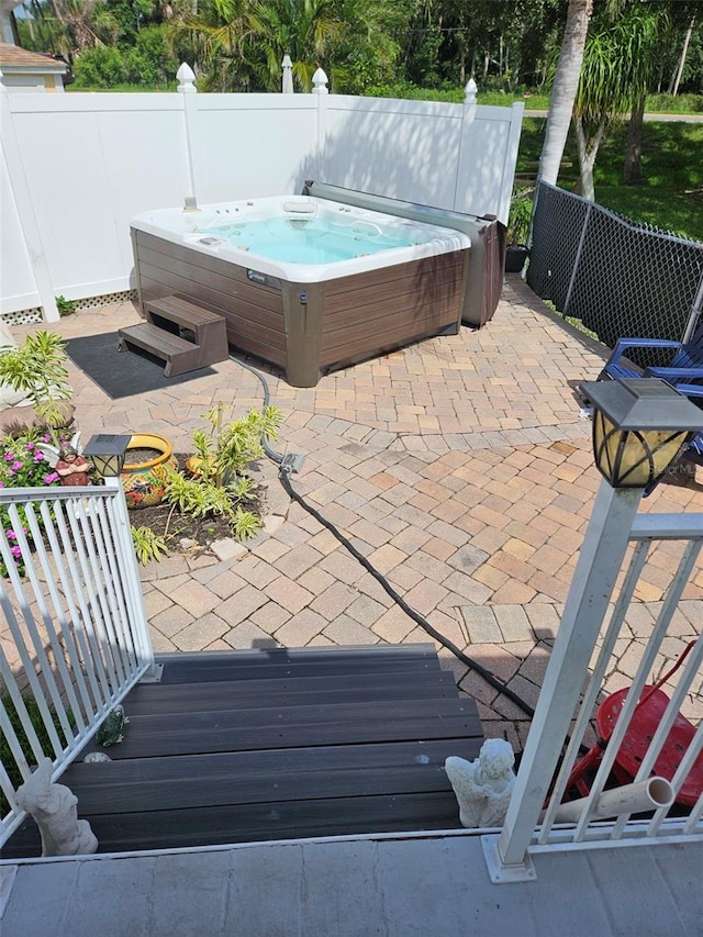 7950 Hwy 78 W Unit 171, Okeechobee, FL 34974 - view of patio featuring a hot tub
