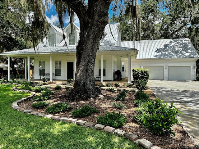 view of front of home with a garage and covered porch