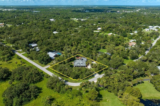 drone / aerial view with a view of trees