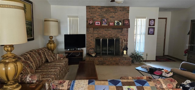 living room with carpet floors and a brick fireplace