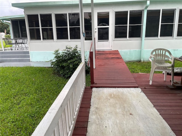 deck with a sunroom