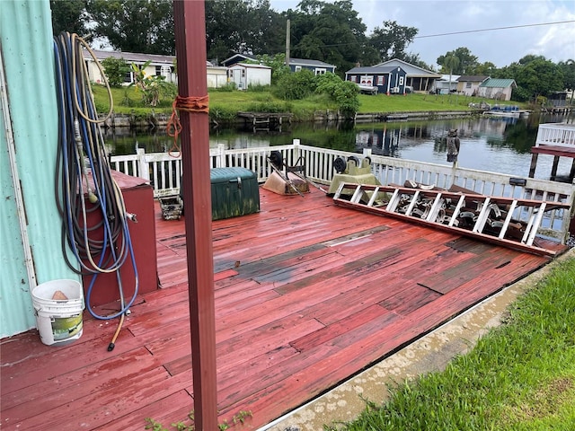 deck featuring a water view