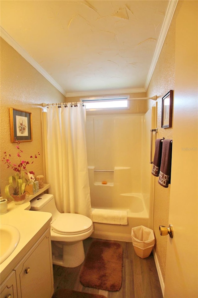 full bathroom featuring wood-type flooring, toilet, vanity, and ornamental molding