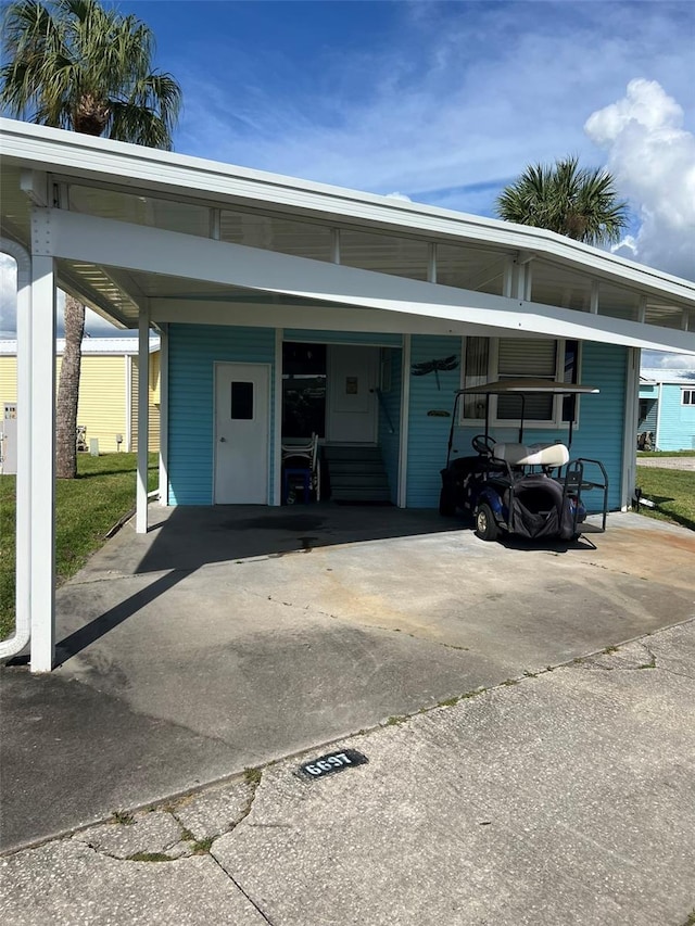 view of parking with a carport