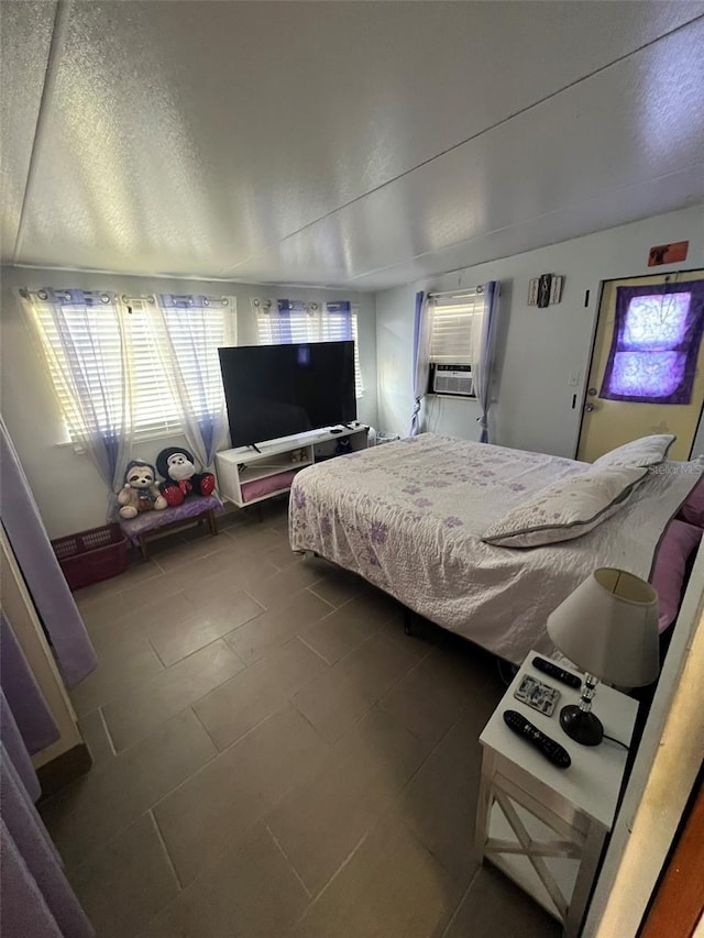 6697 SE 51st Ln Iii, Unit Iii, Okeechobee, FL 34974 - bedroom featuring a textured ceiling