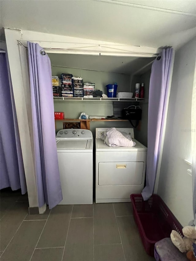 6697 SE 51st Ln Iii, Unit Iii, Okeechobee, FL 34974 - clothes washing area featuring independent washer and dryer, laundry area, and tile patterned floors