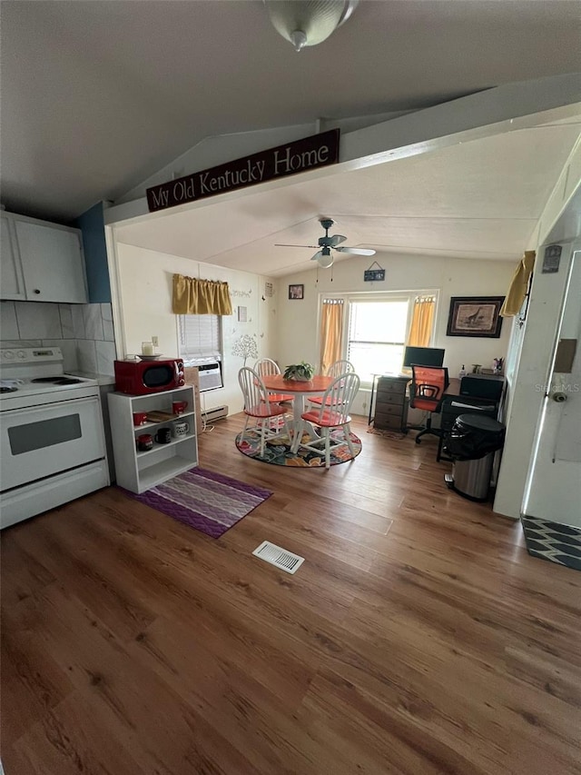 kitchen featuring backsplash, white electric stove, vaulted ceiling, ceiling fan, and dark wood-type flooring