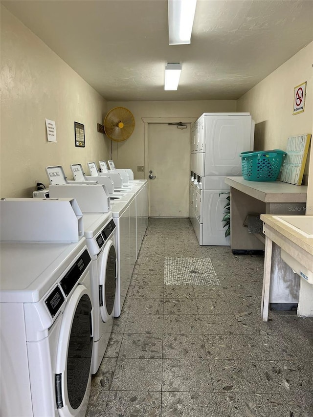 6697 SE 51st Ln Iii, Unit Iii, Okeechobee, FL 34974 - community laundry room with stacked washer and clothes dryer and washer and clothes dryer