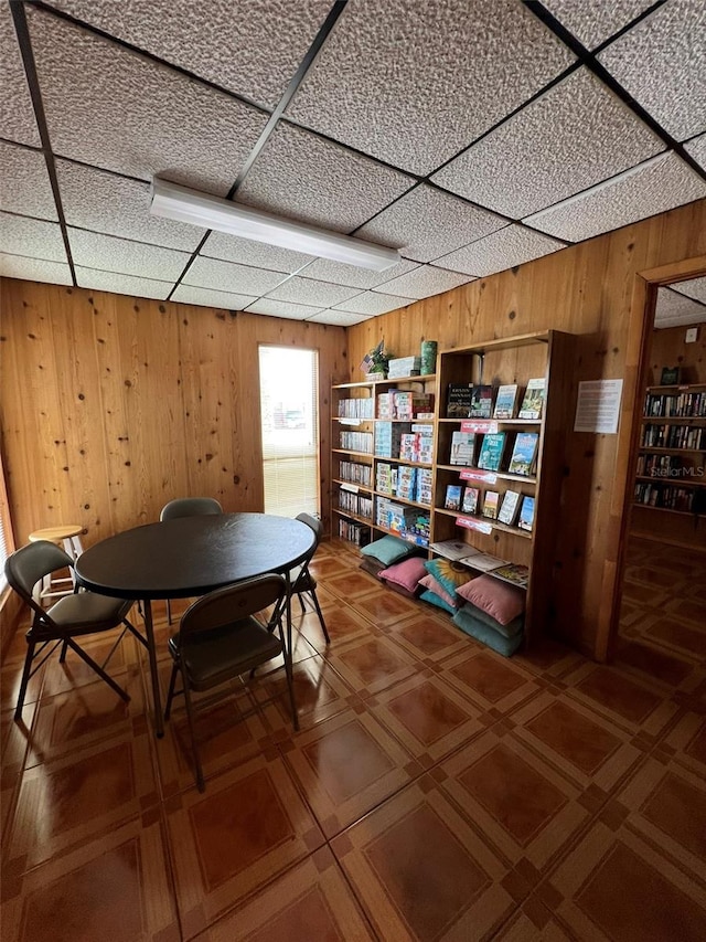 interior space featuring wooden walls