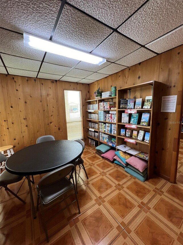 interior space featuring wood walls