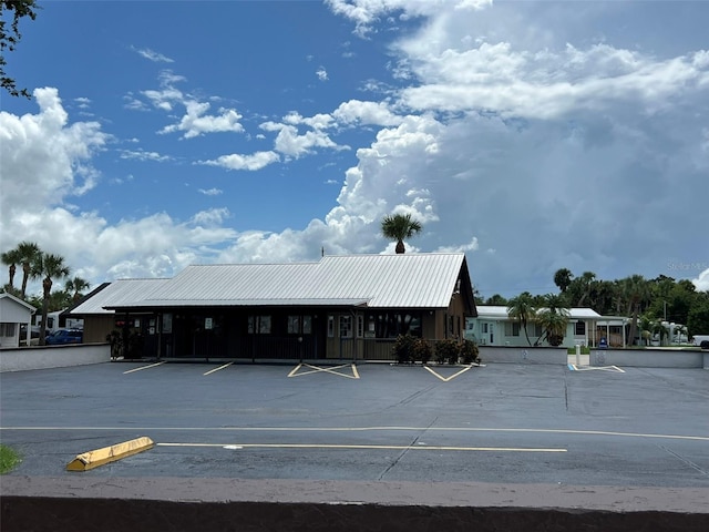 6697 SE 51st Ln Iii, Unit Iii, Okeechobee, FL 34974 - view of property with uncovered parking