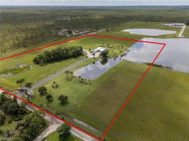 aerial view featuring a water view and a rural view