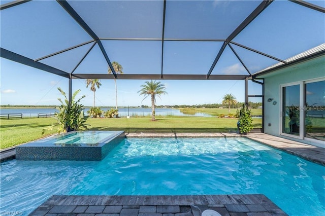 view of pool featuring glass enclosure, an in ground hot tub, and a water view