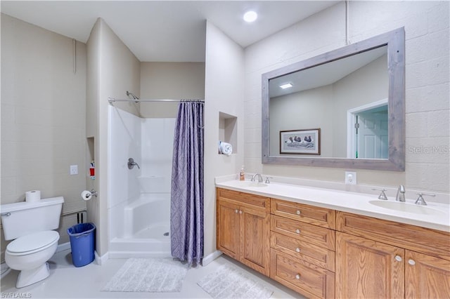 bathroom with vanity, toilet, and a shower with curtain