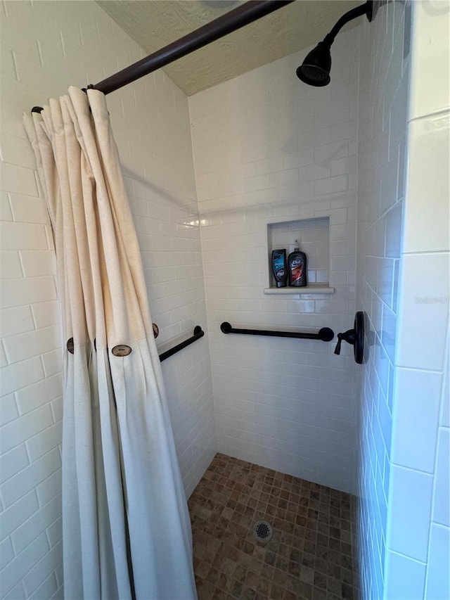 bathroom with curtained shower