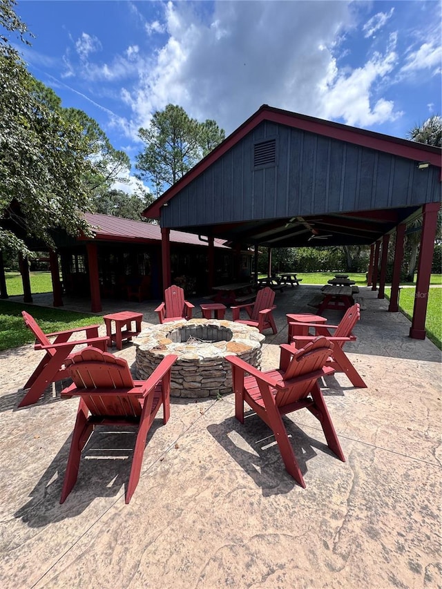 view of patio / terrace with a gazebo and an outdoor fire pit