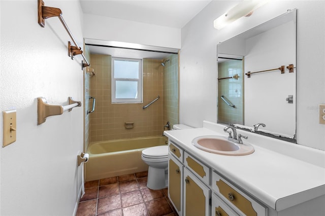 full bathroom featuring vanity, toilet, and tiled shower / bath combo