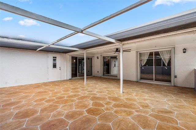 view of patio featuring ceiling fan