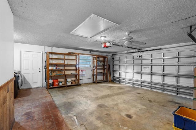 garage with ceiling fan and a garage door opener