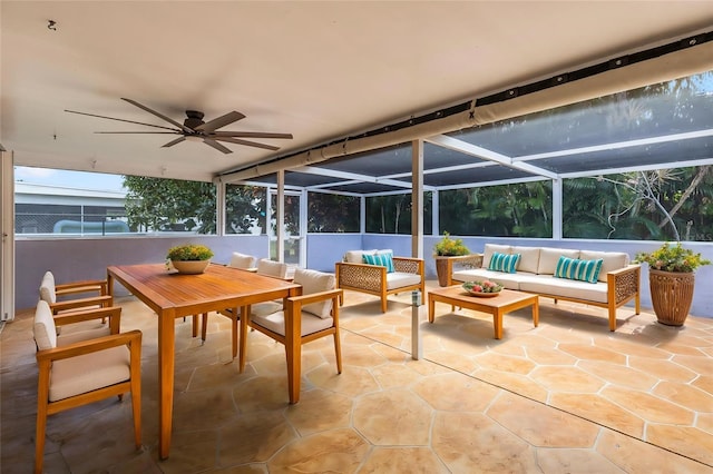 view of patio / terrace featuring an outdoor hangout area, ceiling fan, and a lanai