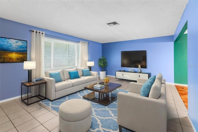 living room featuring light tile patterned floors