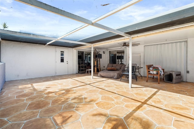 view of patio / terrace featuring ceiling fan