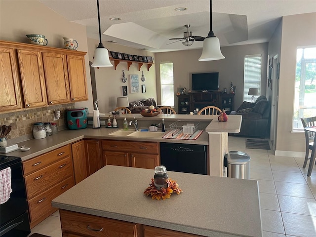 kitchen with dishwasher, ceiling fan, pendant lighting, light tile patterned floors, and tasteful backsplash