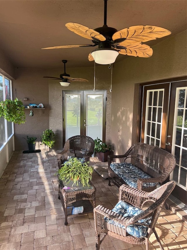 view of patio / terrace featuring french doors and ceiling fan