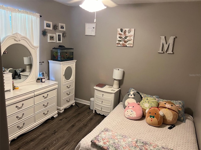 bedroom featuring dark wood-type flooring and ceiling fan