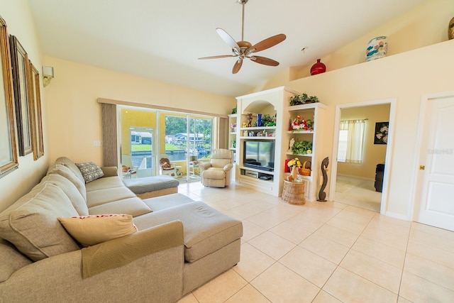 living room featuring ceiling fan, high vaulted ceiling, and light tile patterned floors