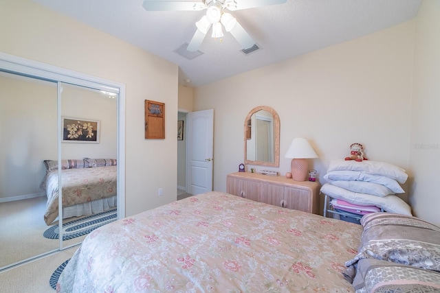 bedroom featuring carpet flooring, a closet, and ceiling fan