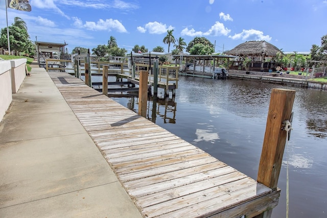 dock area featuring a water view and a gazebo