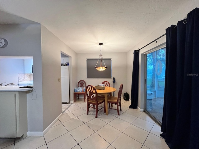 dining space with light tile patterned floors