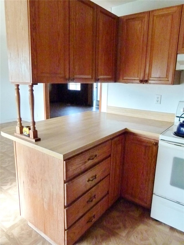 kitchen with light parquet flooring, extractor fan, and white electric range oven