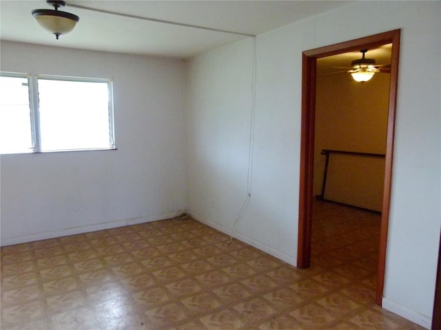 spare room featuring ceiling fan