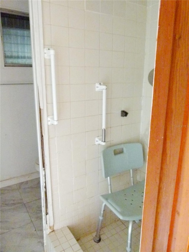 bathroom with tile patterned floors