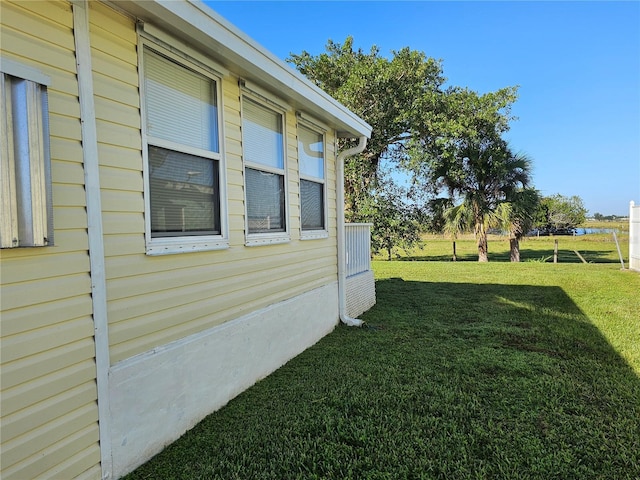 view of home's exterior featuring a lawn