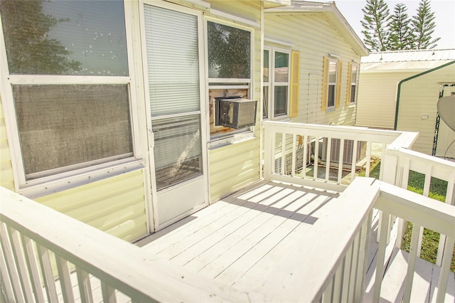 wooden deck with cooling unit and central air condition unit