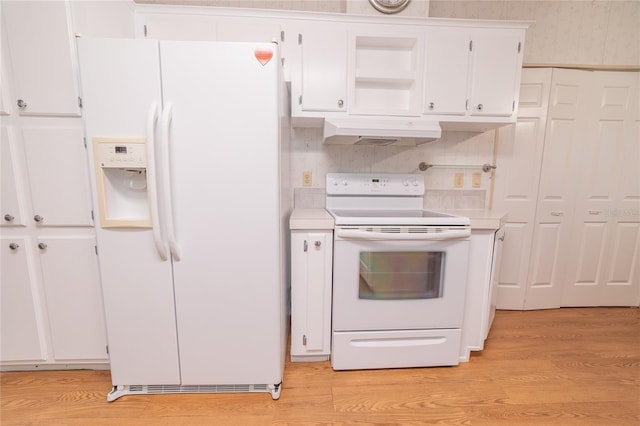 kitchen with white appliances, light hardwood / wood-style floors, and white cabinetry