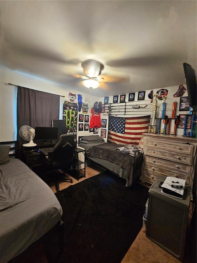 carpeted bedroom featuring ceiling fan